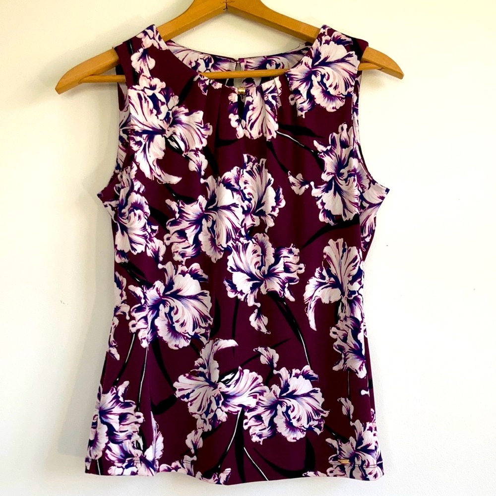 Ivan’s trump floral print sleeveless blouse